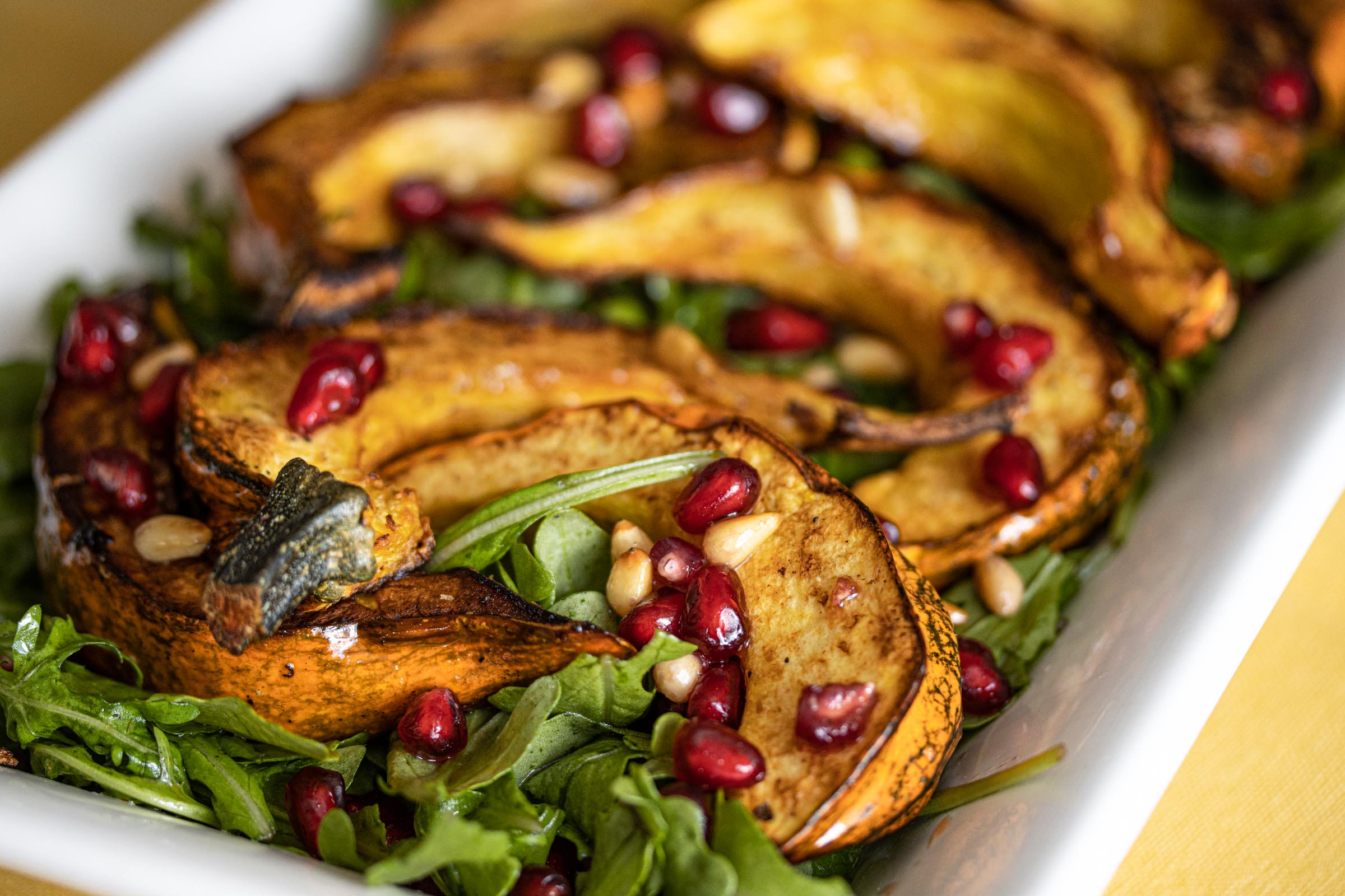 Pomegranate Seeds, Acorn Squash Arugula Salad Pomegranate Seeds, Acorn Squash Arugula Salad