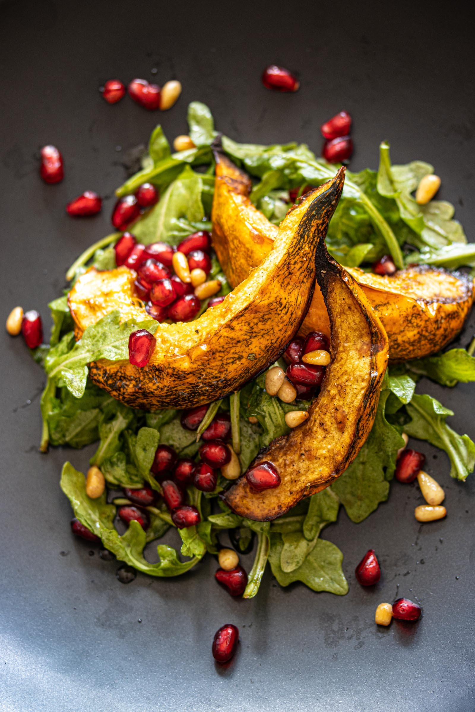 Pomegranate Seeds, Acorn Squash Arugula Salad Pomegranate Seeds, Acorn Squash Arugula Salad